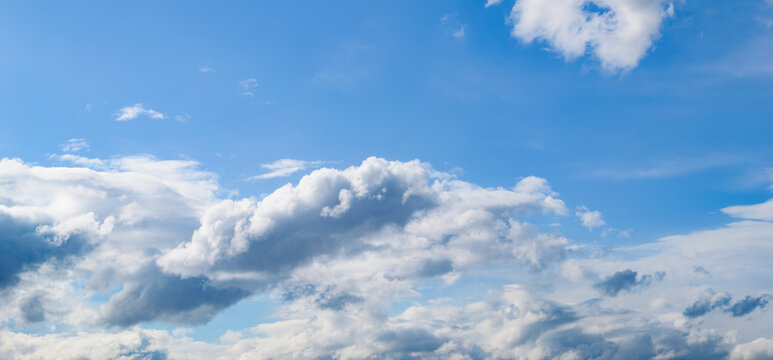 Beautiful cumulus clouds in a blue sky