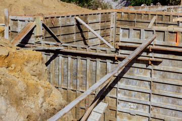 An assembled metal formwork has been purpose of pouring concrete to foundation house