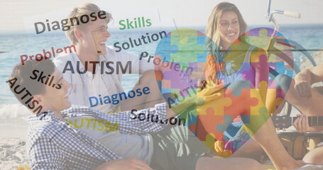 Image of colourful puzzle pieces heart and autism text over happy friends at summer beach party