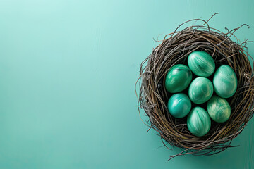 Fototapeta premium top view green easter eggs in nest on green background with copy space