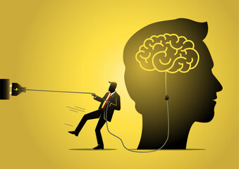A businessman trying to unplug the brain Business concept