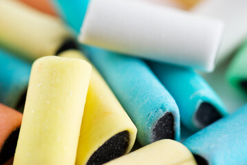 Bunch of gummies or chewing candies with licorice, closeup. Swedish candy.