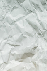 Obraz premium Crumpled white paper background.