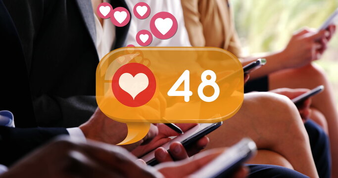Digital image of a heart icon and increasing numbers inside a yellow chat box - Powered by Adobe