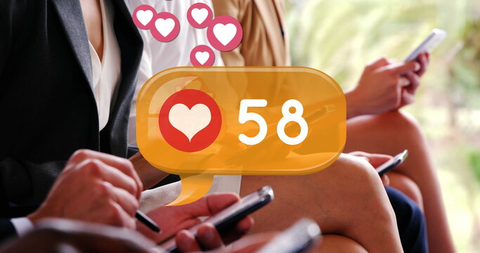 Digital image of a heart icon and increasing numbers inside a yellow chat box