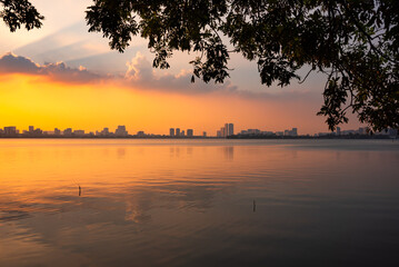Skyline of Hanoi city, Vietnam on sunset over lake