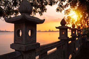 Beautiful sunset over lake in Hanoi city, Vietnam - 758034722