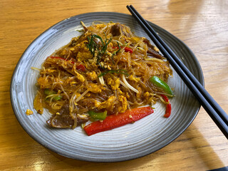 Fried vermicelli in a plate on the table