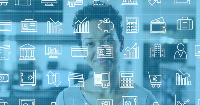 Image of financial icons over biracial woman smiling at camera in office - Powered by Adobe