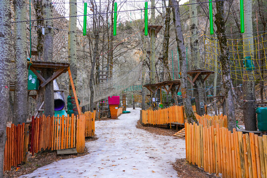 Tree climbing rope course in the Parc de la Schappe in Brian&ccedil;on, a small town of the Hautes-Alpes department in the French Alps