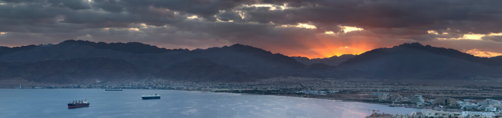 Panoramic morning view on Eilat (Israel) and Aqaba (Jordan) cities seen from surrounding hills in Eilat- 758037982