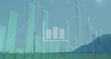 Image of graphs with financial data moving against wind turbines on field