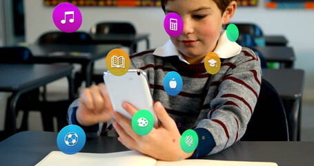 Image of colorful icons over caucasian schoolboy using smartphone