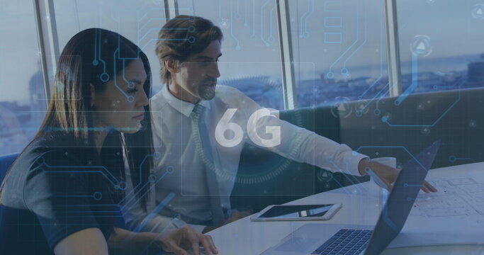 Image of 6g text and microprocessor connections over businessman and businesswoman discussing