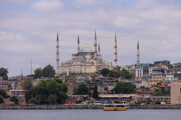 Fototapeta premium Old Mosques with minarets in Istanbul, Turkey. Details of architecture and interior, arches and columns.