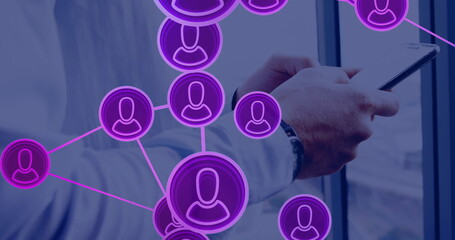 Image of network of connections with icons over caucasian man using smartphone