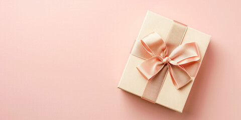 luxury gift box with silk and ribbon pastel background copy space