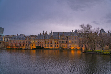 The Hague, Netherlands March 22 2023: Binnenhof castle (Dutch Parliament) with the Hofvijver lake...
