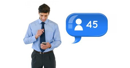 Front view of a Caucasian businessman typing on his phone