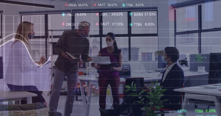 Image of financial data processing over diverse business people wearing face masks