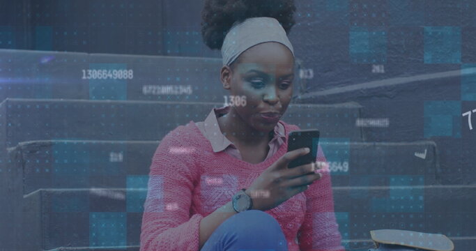 Image of changing numbers over african american woman drinking coffee and using smartphone - Powered by Adobe