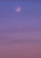 crescent moon and venus in the sky, pink sky