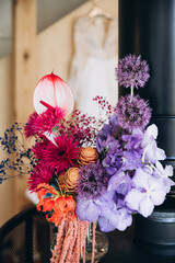 Wedding. Bridal bouquet of bright and colorful flowers с лентой