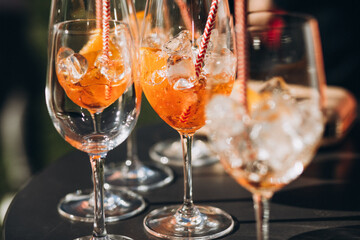 Party. Glasses with ice and cocktails. Aperol spritz