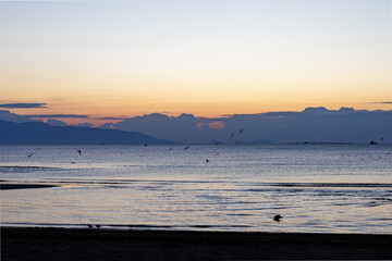 Sunset serenity on a tranquil Mediterranean beach - 758062507