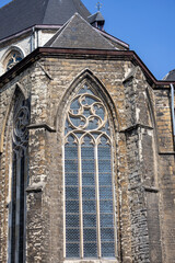 Fototapeta na wymiar Saint James Church with 12th century Romanesque towers and Gothic spire, Ghent, Belgium
