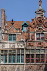 Relief of decorative facade of historic tenement house at Kraanlei street, Ghent, Belgium
