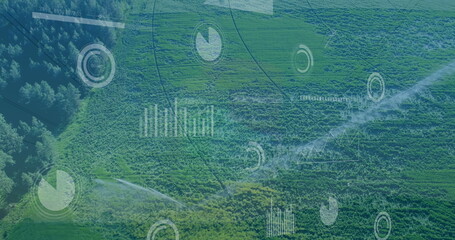 Image of multiple screens with data processing against aerial view of grassland
