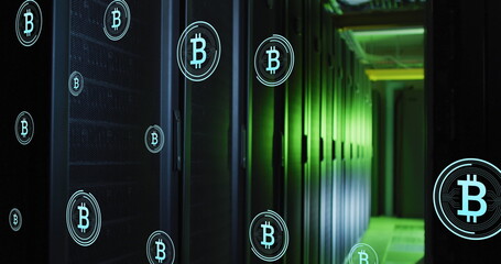 Image of multiple bitcoin symbols floating against computer server room