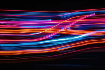Abstract, neon light streaks against a deep black setting