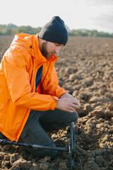 A man with a metal detector does archeology.