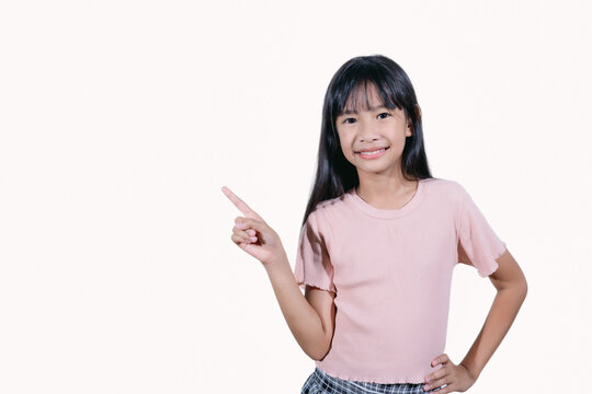 Image of Asian child posing on white background