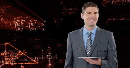 Image of data processing and mathematical equations over businessman using tablet