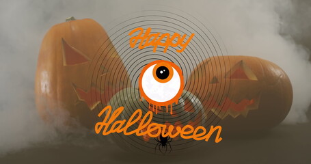 Happy halloween text banner with scary eye icon against against smoke effect over pumpkins