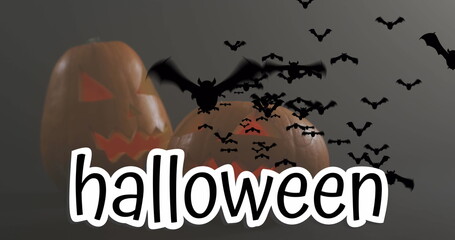 Halloween text banner and multiple flying bat icons over halloween pumpkins against grey background