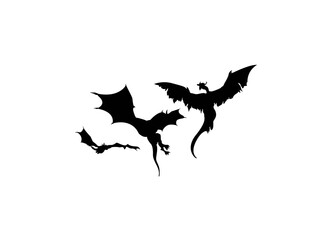 Stylized image of Dragons in black and white..Flying Black Dragon Silhouette Collection.Dragon Front Glide.Vector set of silhouettes of dragons stencil.
