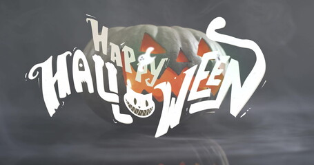 Image of happy halloween text with cat over pumpkin