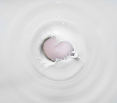 Soap falling into water with spash