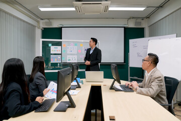 Business meeting scene concept with asian business diverse team and manager presentor with paper...