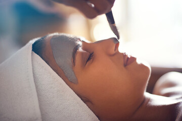 Woman, wellness and mask in spa for skincare, beauty and cosmetic treatment for break or peace....