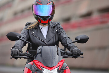 young woman on a motorcycle