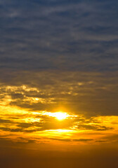 Obraz premium Sky with cirrus clouds and bright sunrise. Vertical photo