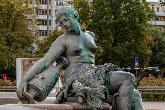 September 2022 -Fountain depicting the Roman god of water, Neptune, & 4 women representing Prussia's main rivers in Berlin, the capital of Germany, Eu