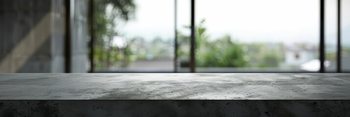 Fototapeta premium A gray concrete table on blurred nature background with copy space for product presentation,Banner, Ready for product montage