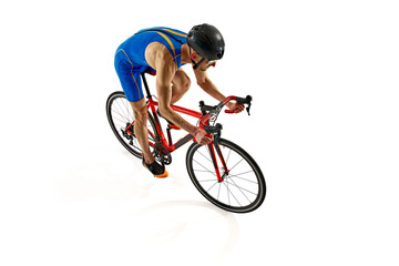 Fototapeta premium Top view image of man, athlete in uniform, helmet and goggles riding bicycle isolated on white studio background. Concept of sport, active and healthy lifestyle, speed, endurance, hobby