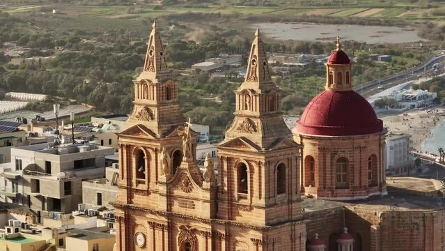 Drone view of Parish Church in Mellieha city. Closeup of the dome. Malta island